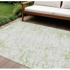 Photo of Green And Ivory Abstract Washable Indoor Outdoor Area Rug