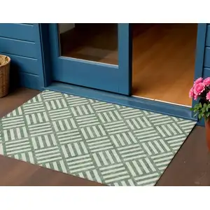 Photo of Green And Ivory Geometric Washable Indoor Outdoor Area Rug