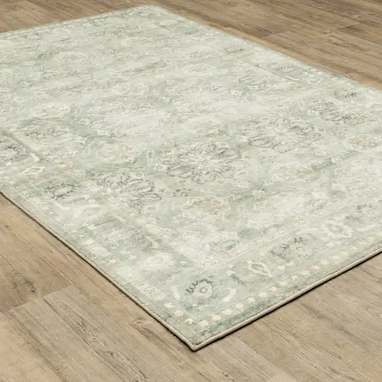 Green And Ivory Oriental Power Loom Stain Resistant Area Rug Photo 5