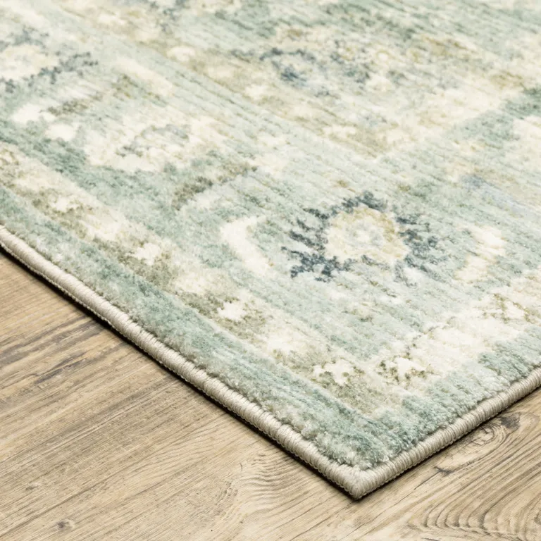 Green And Ivory Oriental Power Loom Stain Resistant Area Rug Photo 4