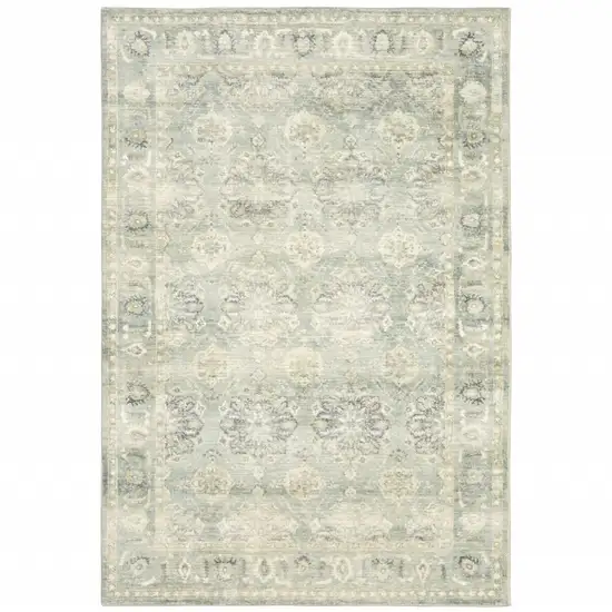 Green And Ivory Oriental Power Loom Stain Resistant Area Rug Photo 1