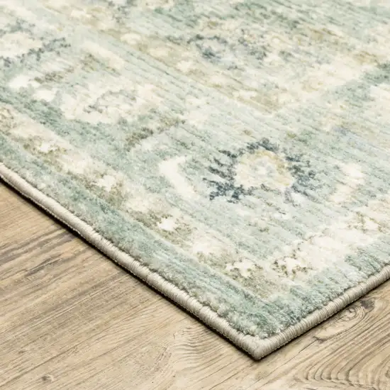 Green And Ivory Oriental Power Loom Stain Resistant Runner Rug Photo 5