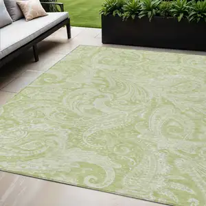 Photo of Green And Ivory Paisley Washable Indoor Outdoor Area Rug