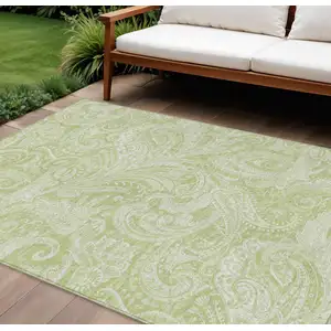 Photo of Green And Ivory Paisley Washable Indoor Outdoor Area Rug