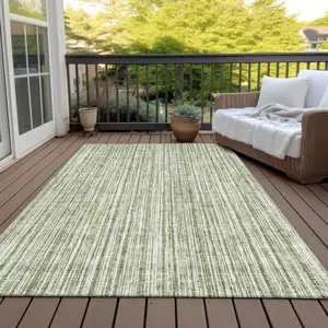 Photo of Green And Ivory Striped Washable Indoor Outdoor Area Rug