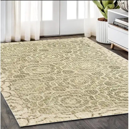 Green And Ivory Wool Geometric Hand Tufted Area Rug Photo 1