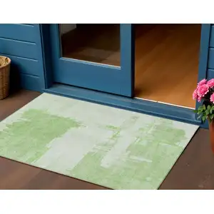 Photo of Green And Mint Green Abstract Washable Indoor Outdoor Area Rug