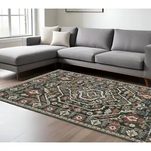 Photo of Green And Pink Floral Area Rug With Fringe