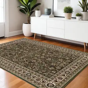 Photo of Green Black And Ivory Oriental Area Rug