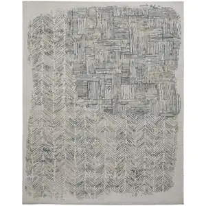 Photo of Green Blue And Ivory Abstract Hand Woven Area Rug