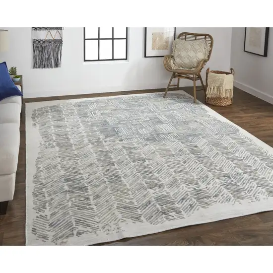 Green Blue And Ivory Abstract Hand Woven Distressed Area Rug Photo 6