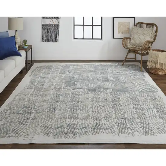 Green Blue And Ivory Abstract Hand Woven Distressed Area Rug Photo 5