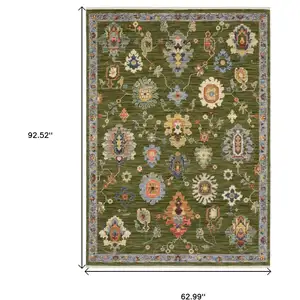 Photo of Green Blue And Yellow Oriental Area Rug With Fringe