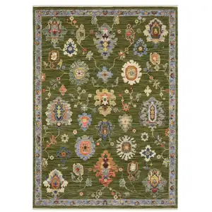 Photo of Green Blue And Yellow Oriental Area Rug With Fringe