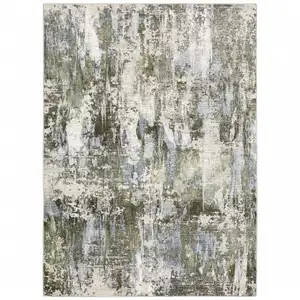 Photo of Green Blue Grey Ivory And Brown Abstract Power Loom Stain Resistant Area Rug