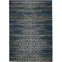 Photo of Green Blue and Ivory Abstract Power Loom Worn Faded Area Rug