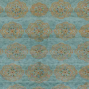 Photo of Green Blue and Taupe Floral Hand Knotted Worn Faded Area Rug