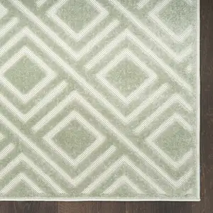 Photo of Green Geometric Area Rug