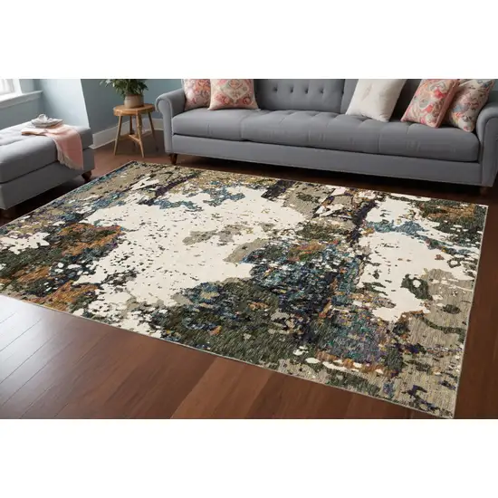 Blue and Ivory Abstract Power Loom Area Rug Photo 1