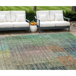 Photo of Green Gold And Teal Blue Abstract Washable Indoor Outdoor Area Rug