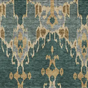 Photo of Green Gray And Gold Ikat Washable Indoor Outdoor Area Rug