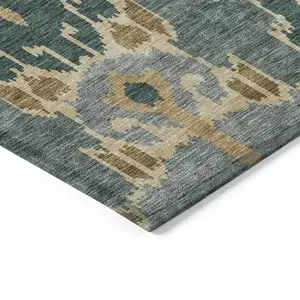 Photo of Green Gray And Gold Ikat Washable Indoor Outdoor Area Rug