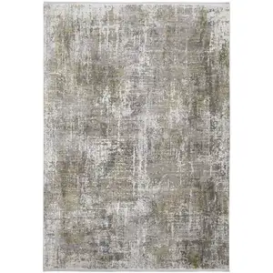 Photo of Green Gray And Ivory Abstract Area Rug With Fringe