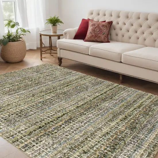 Gray and Ivory Abstract Power Loom Area Rug Photo 1