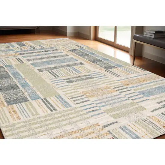 Gray and Ivory Geometric Power Loom Area Rug Photo 1