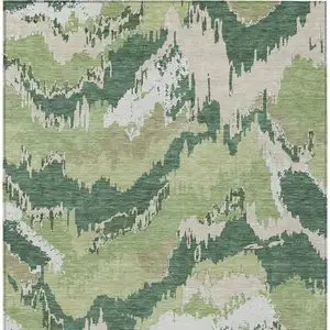 Photo of Green Ivory And Beige Abstract Washable Indoor Outdoor Area Rug