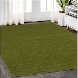 Photo of Green Wool Hand Tufted Area Rug