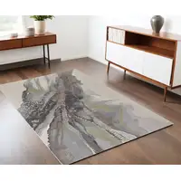 Photo of Green and Brown Abstract Power Loom Area Rug
