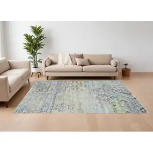 Photo of Green and Gray Abstract Power Loom Worn Faded Area Rug