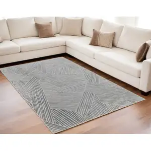 Photo of Green and Ivory Abstract Hand Woven Area Rug