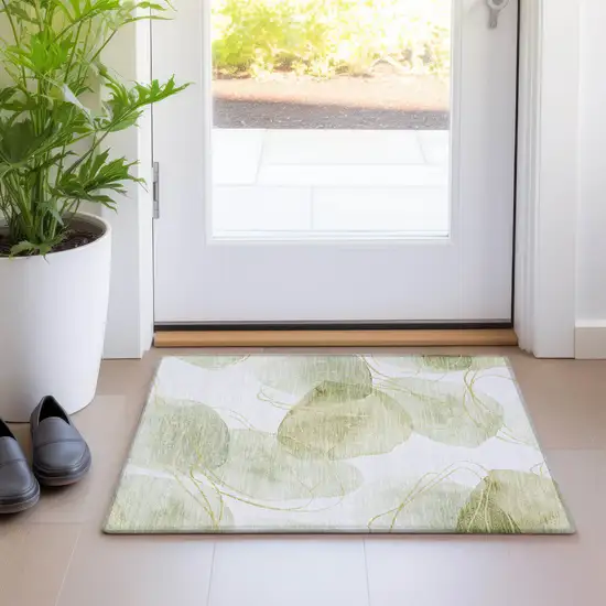 Green and Ivory Abstract Washable Non Skid Indoor Outdoor Area Rug Photo 9