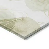 Photo of Green and Ivory Abstract Washable Non Skid Indoor Outdoor Area Rug