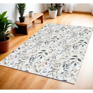 Photo of Green and Ivory Floral Power Loom Washable Non Skid Area Rug