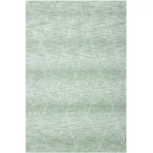 Photo of Green and Ivory Geometric Power Loom Distressed Area Rug