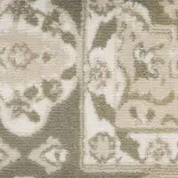 Photo of Green and Ivory Ogee Power Loom Distressed Area Rug