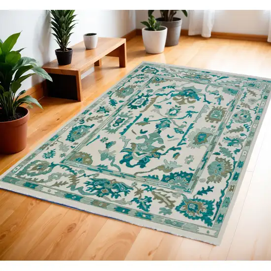 Green and Ivory Wool Floral Hand Knotted Area Rug With Fringe Photo 1