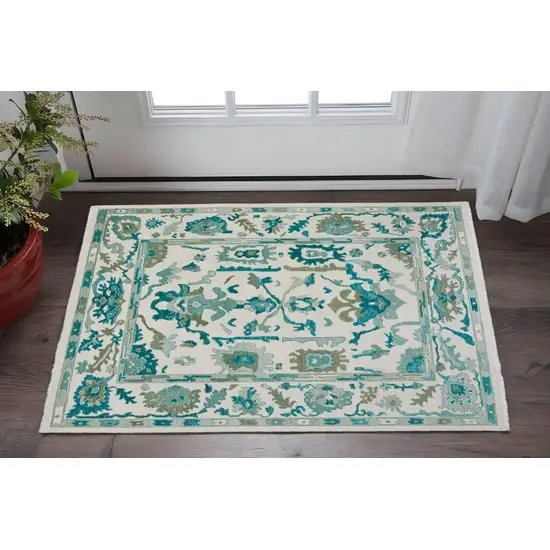 Green and Ivory Wool Floral Hand Knotted Area Rug With Fringe Photo 1