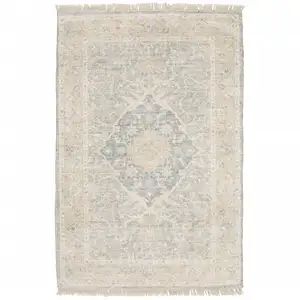 Photo of Grey And Beige Oriental Hand Loomed Stain Resistant Area Rug With Fringe