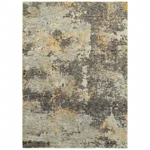 Photo of Grey And Gold Abstract Power Loom Stain Resistant Area Rug