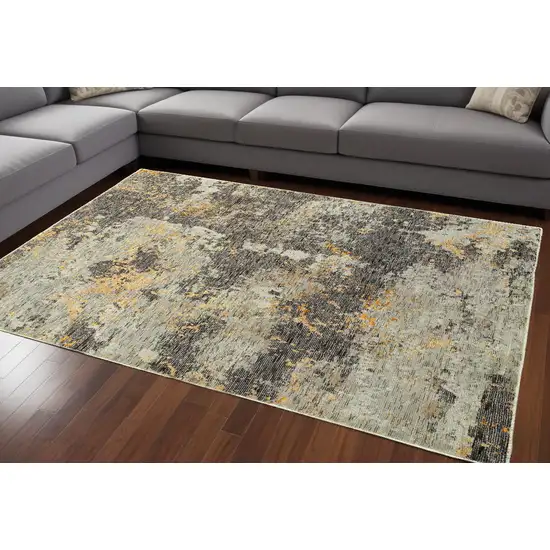 Gray and Ivory Abstract Power Loom Area Rug Photo 1