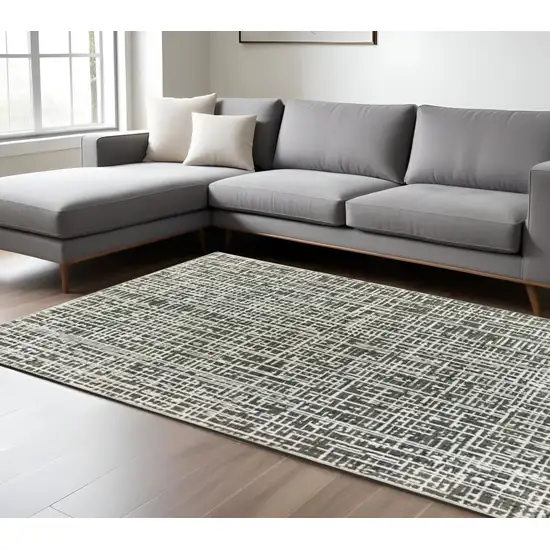 Gray and Ivory Abstract Power Loom Area Rug Photo 1