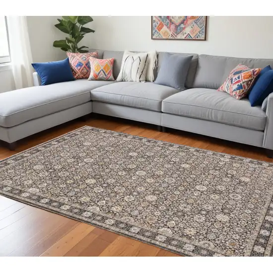 Grey And Ivory Oriental Power Loom Stain Resistant Area Rug With Fringe Photo 1