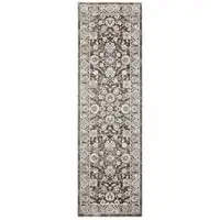 Photo of Grey And Ivory Oriental Power Loom Stain Resistant Runner Rug With Fringe