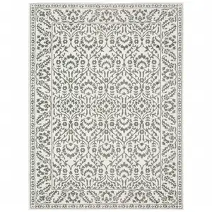 Photo of Grey And White Floral Power Loom Stain Resistant Area Rug