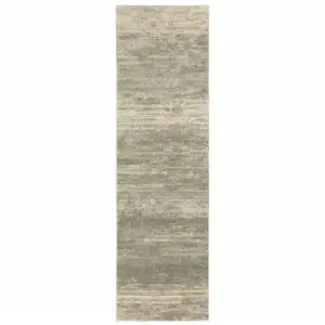 Photo of Grey Beige And Tan Abstract Power Loom Stain Resistant Runner Rug