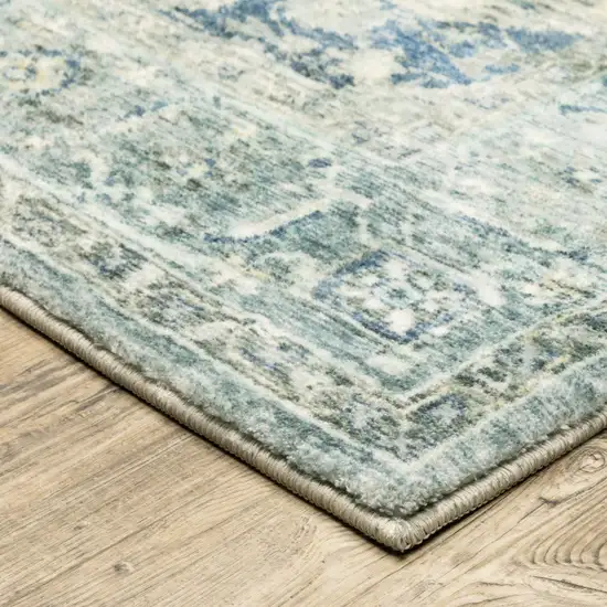 Grey Blue And Ivory Oriental Power Loom Stain Resistant Area Rug Photo 4